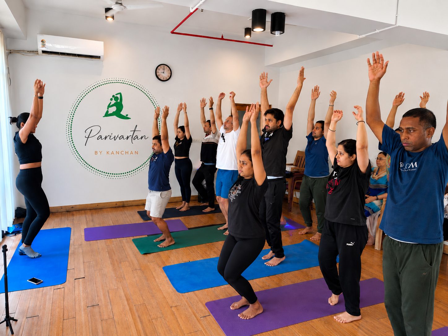 A full Parivartan class practising together in the Kolkata studio