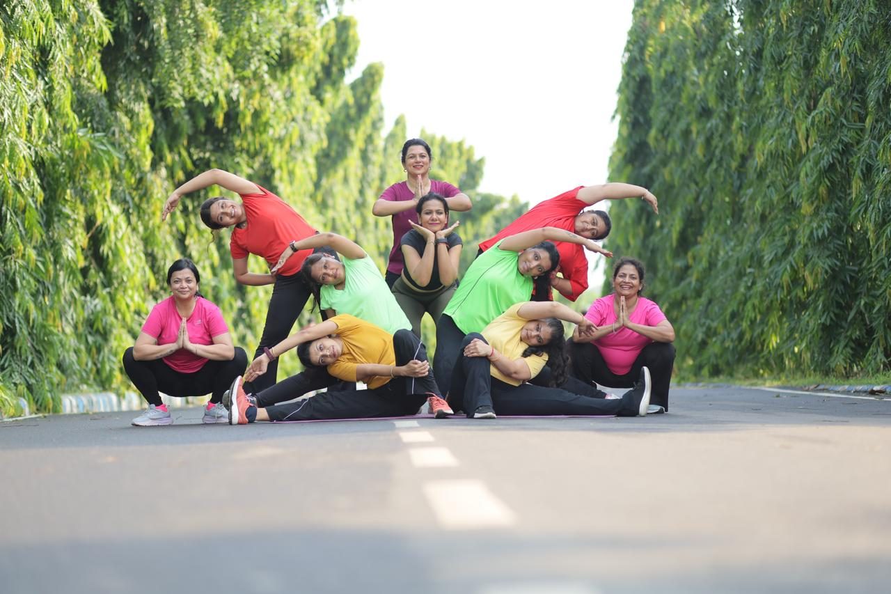 Parivartan community in a playful group pose, smiling together