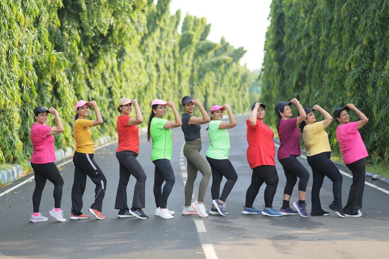 Parivartan members celebrating strength together on their morning avenue